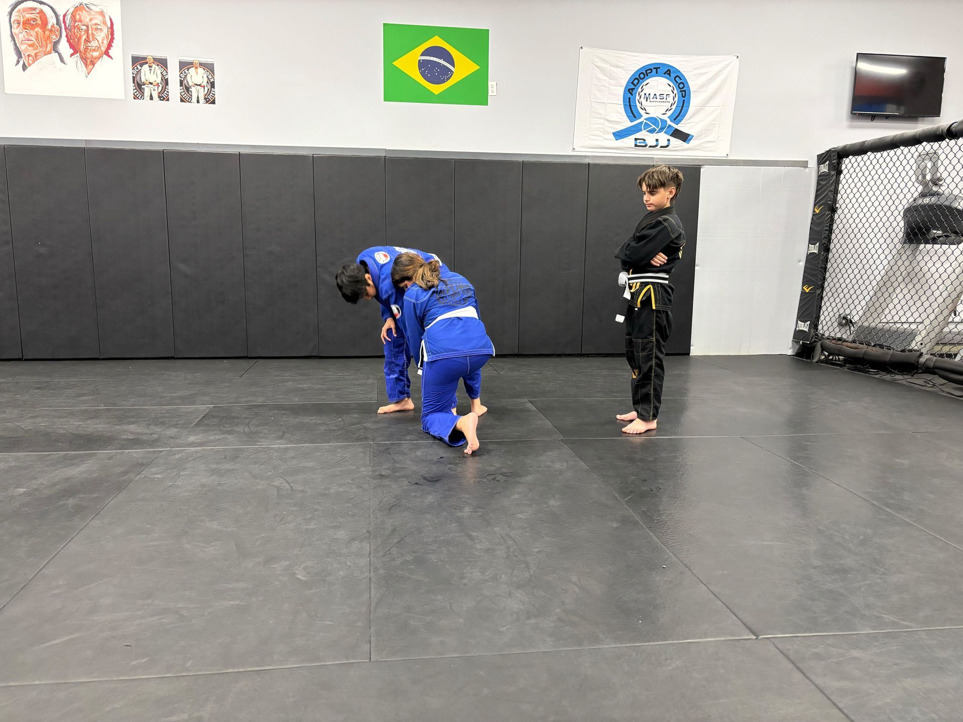 Students training Brazilian Jiu-Jitsu at Lockdown BJJ in Lake Ronkonkoma - a fun workout for stren