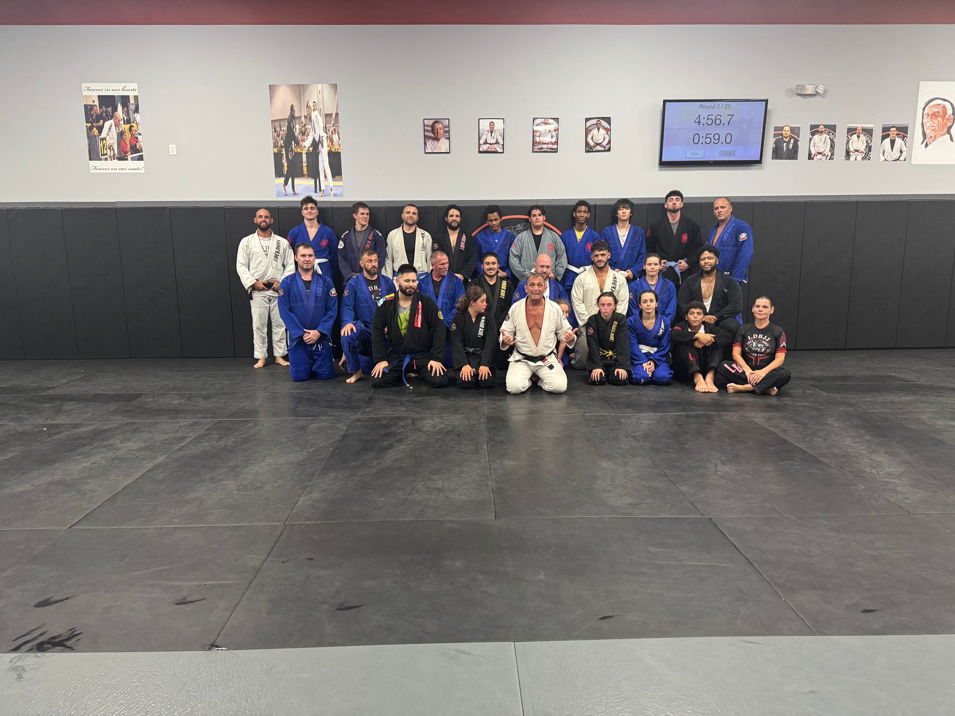 Adults practicing Brazilian Jiu Jitsu drills at Lockdown BJJ in Lake Ronkonkoma, NY to build focus.