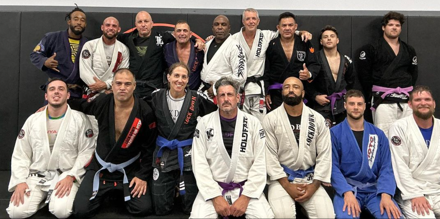 Adults practicing grappling drills at Lockdown BJJ in Lake Ronkonkoma, NY to build fitness.
