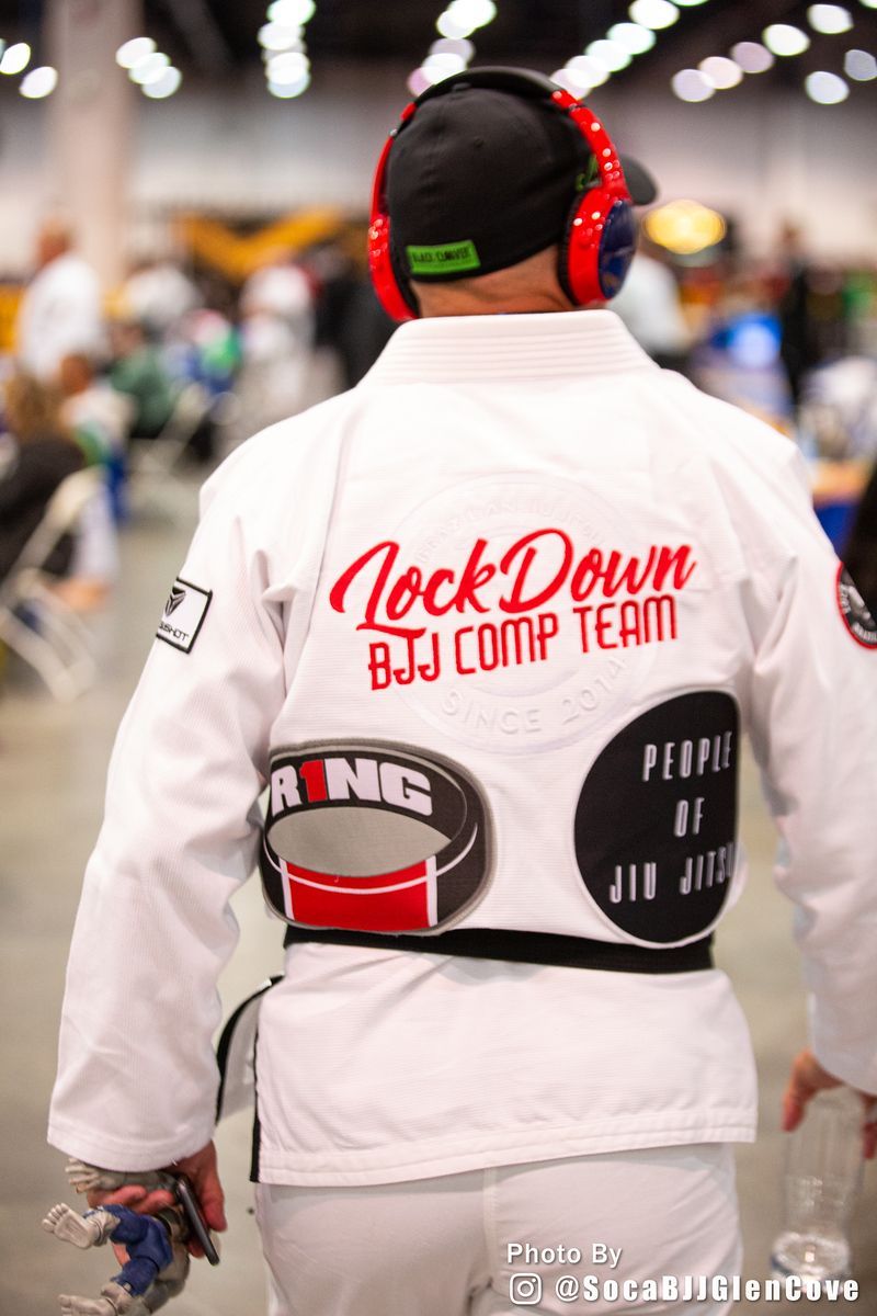 Adults practicing Brazilian Jiu-Jitsu at Lockdown BJJ in Lake Ronkonkoma, NY, building fitness.