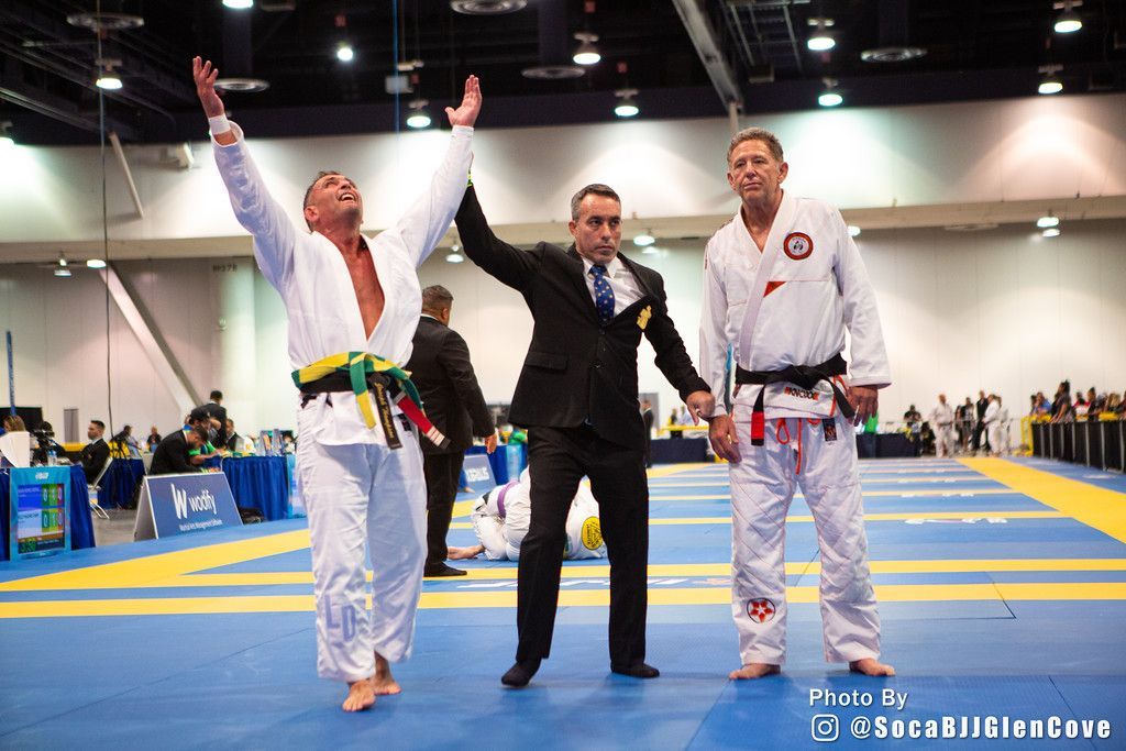 Adults training Brazilian Jiu-Jitsu at Lockdown BJJ in Lake Ronkonkoma, NY, building fitness.