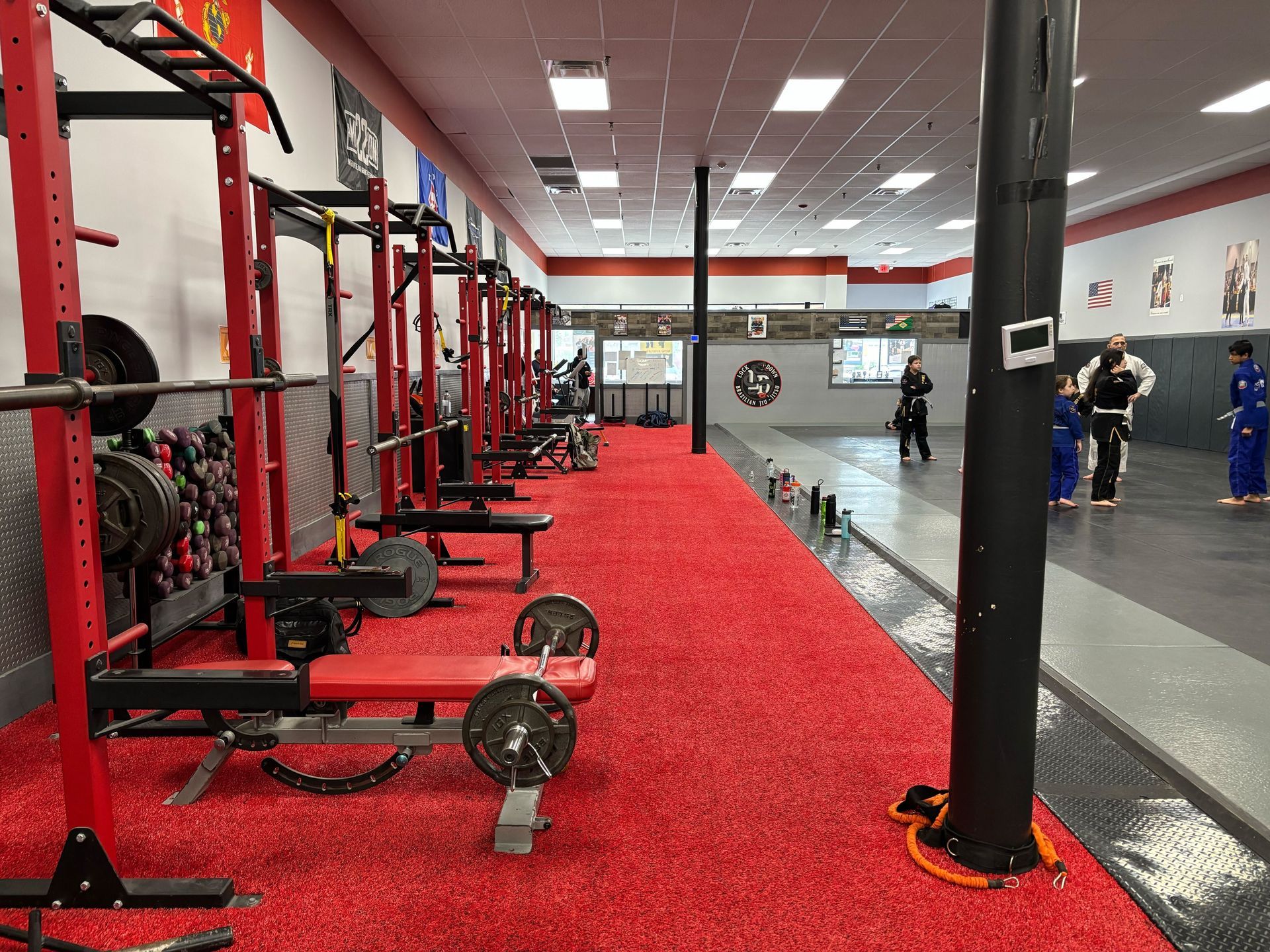Kids and adults practice brazilian jiu jitsu drills at Lockdown BJJ in Lake Ronkonkoma, NY.