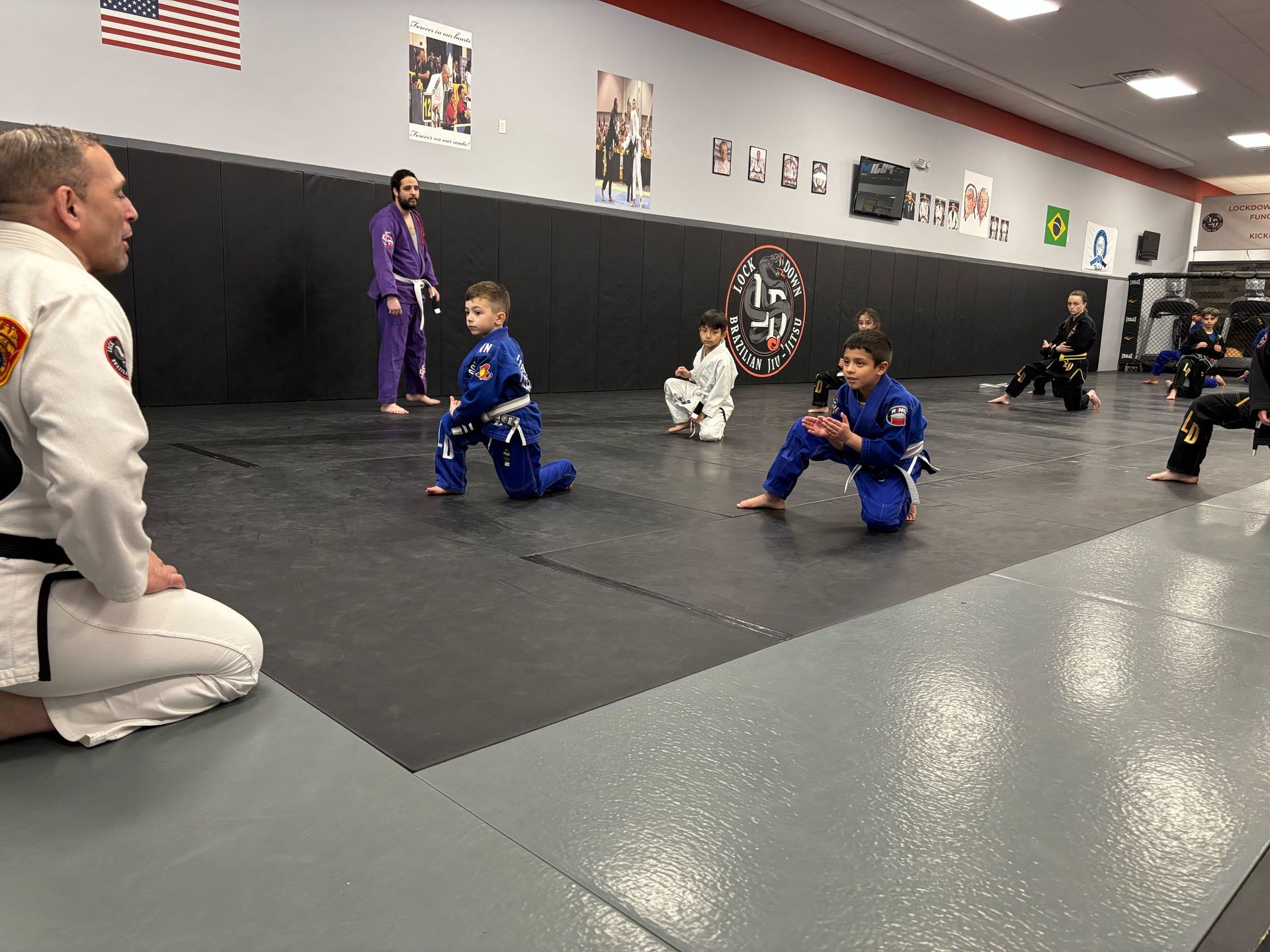 Kids practicing Brazilian Jiu-Jitsu at Lockdown BJJ in Lake Ronkonkoma - building confidence, d