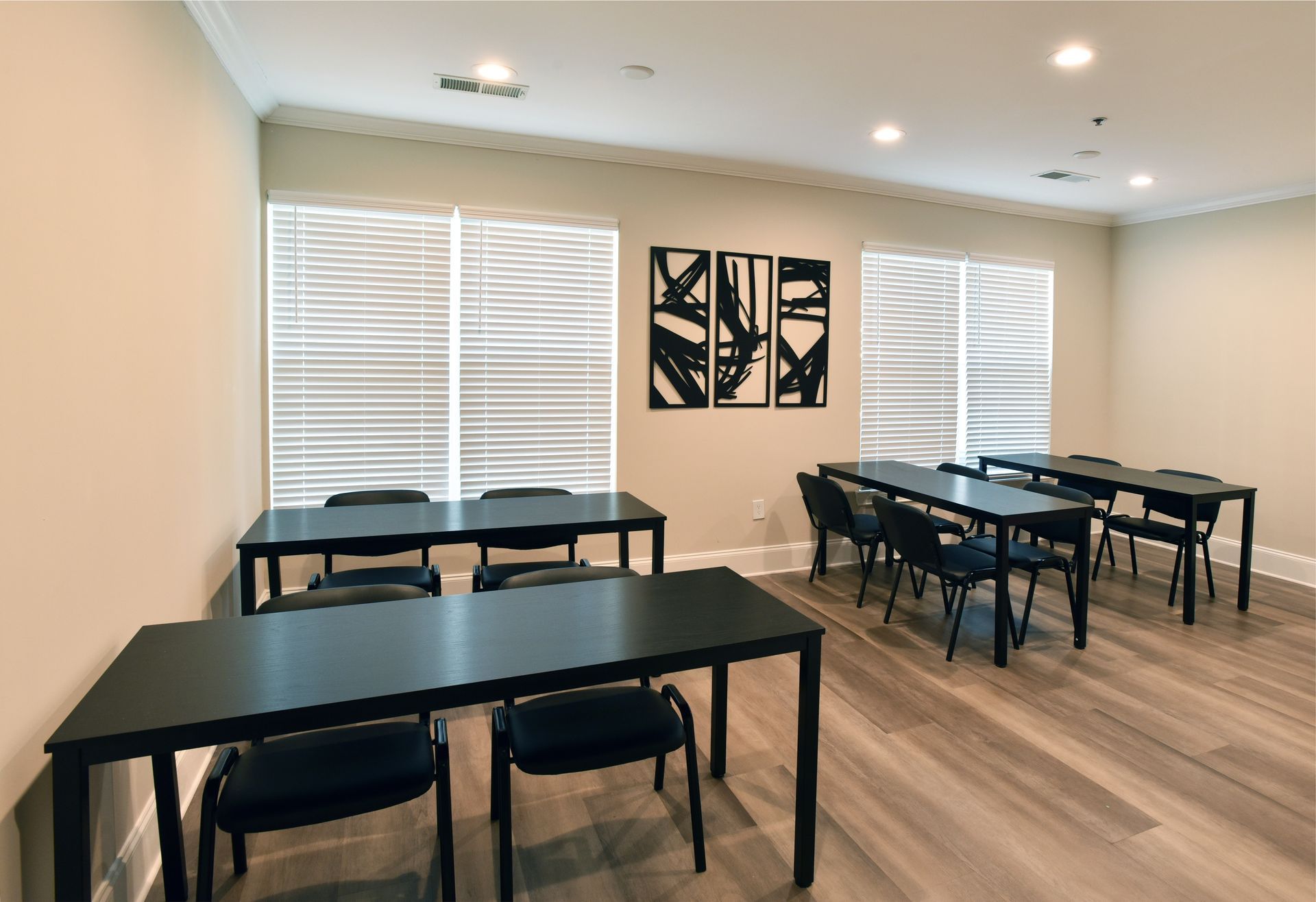 Game room with a pool table, TV, seating area, and large windows