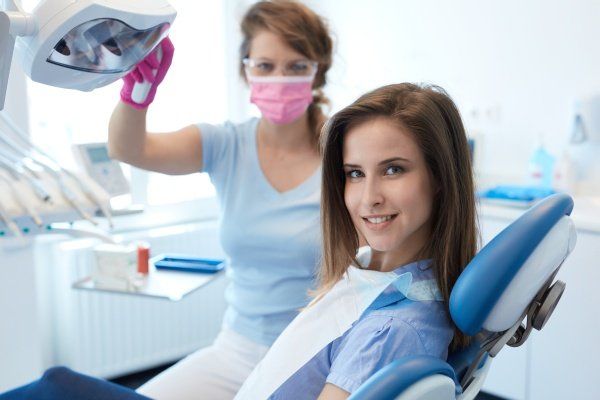 Dental Arts of Catoosa - Catoosa, OK - woman smiling on dentist chair