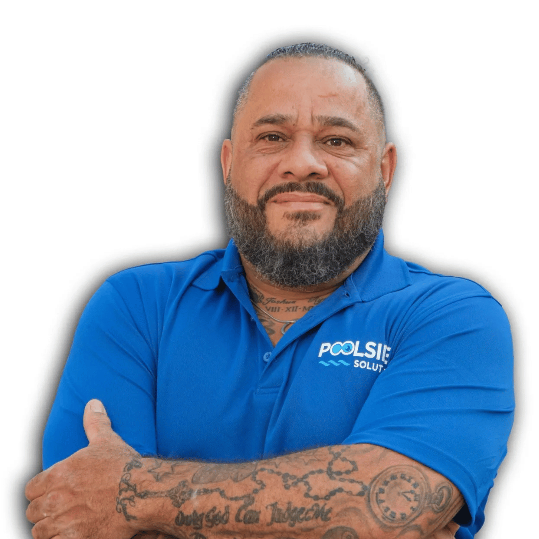 A man with a beard is wearing a blue shirt that says poolside