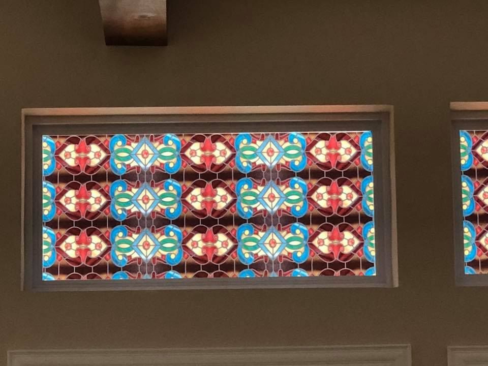 A window with a colorful pattern on it