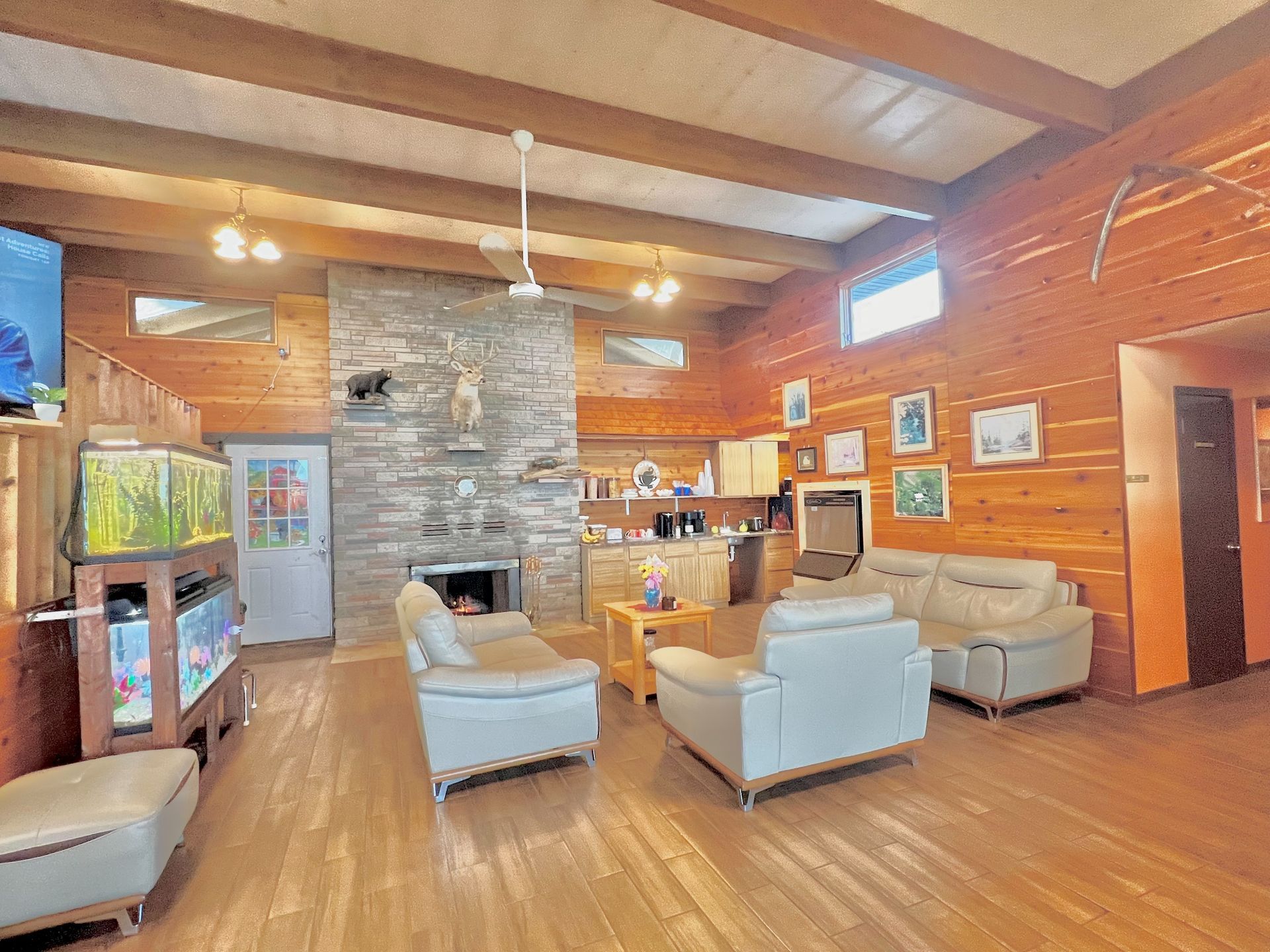 A living room filled with furniture and a fireplace.
