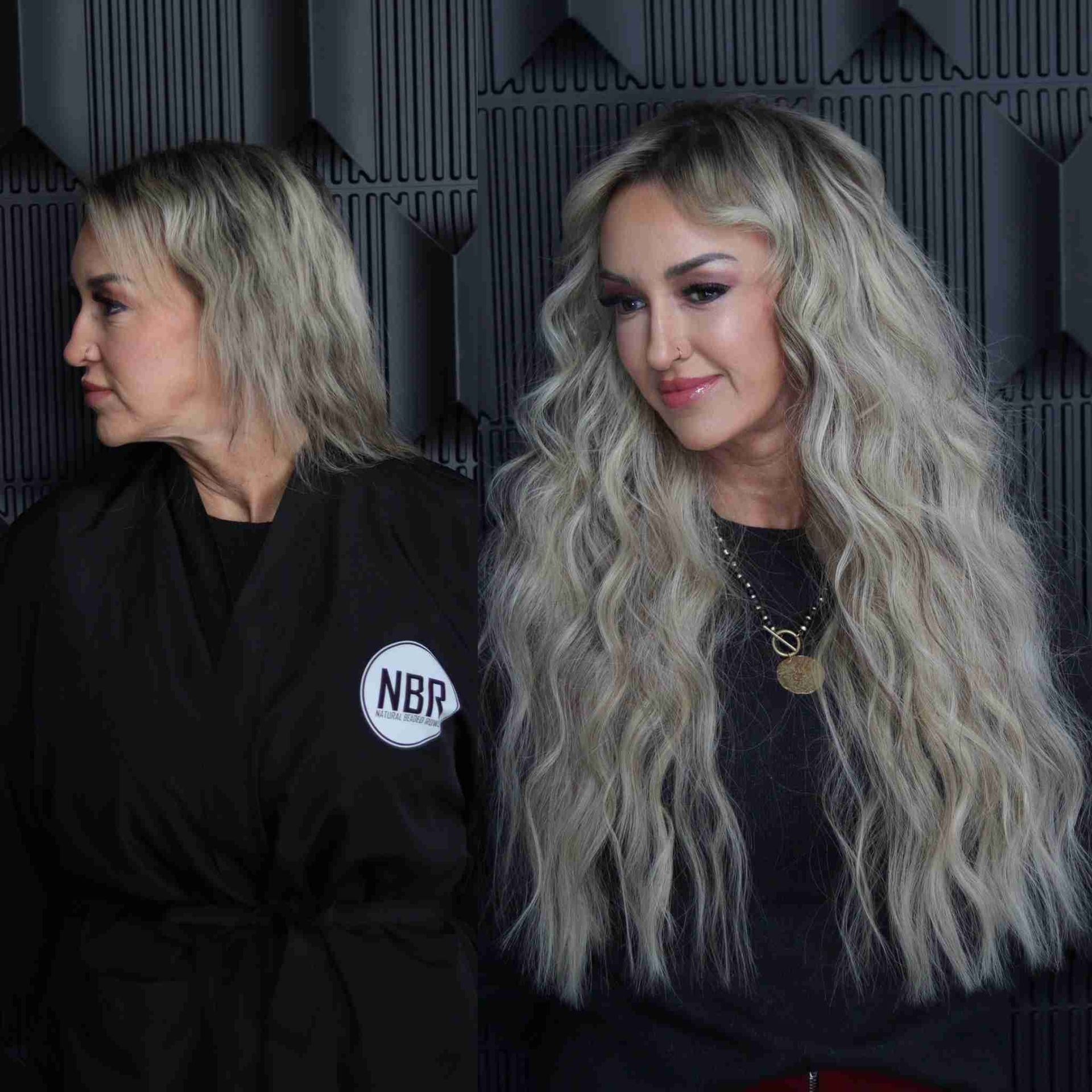 Two women with long blonde hair are standing next to each other.