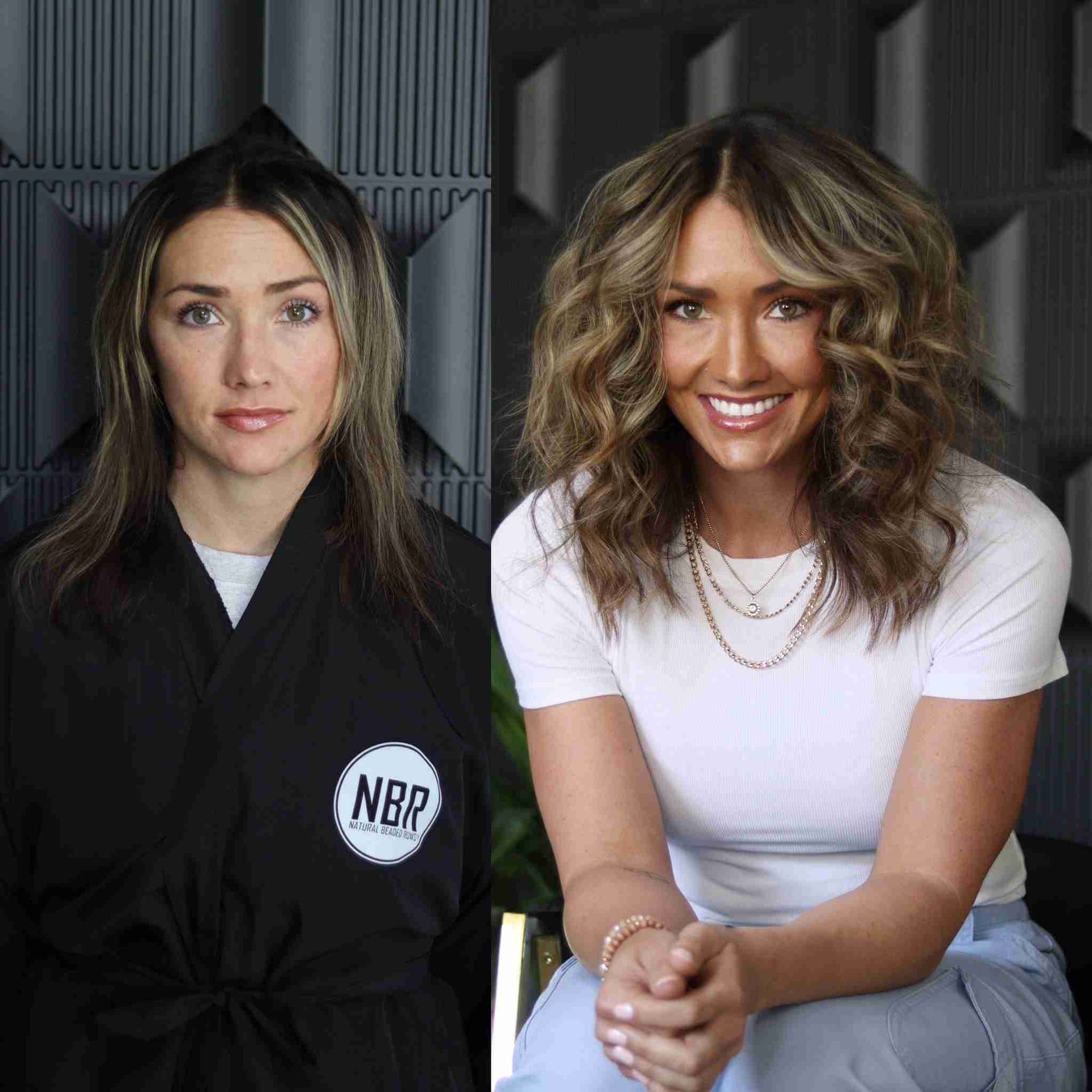 A woman in a black robe and a woman in a white shirt are sitting next to each other.