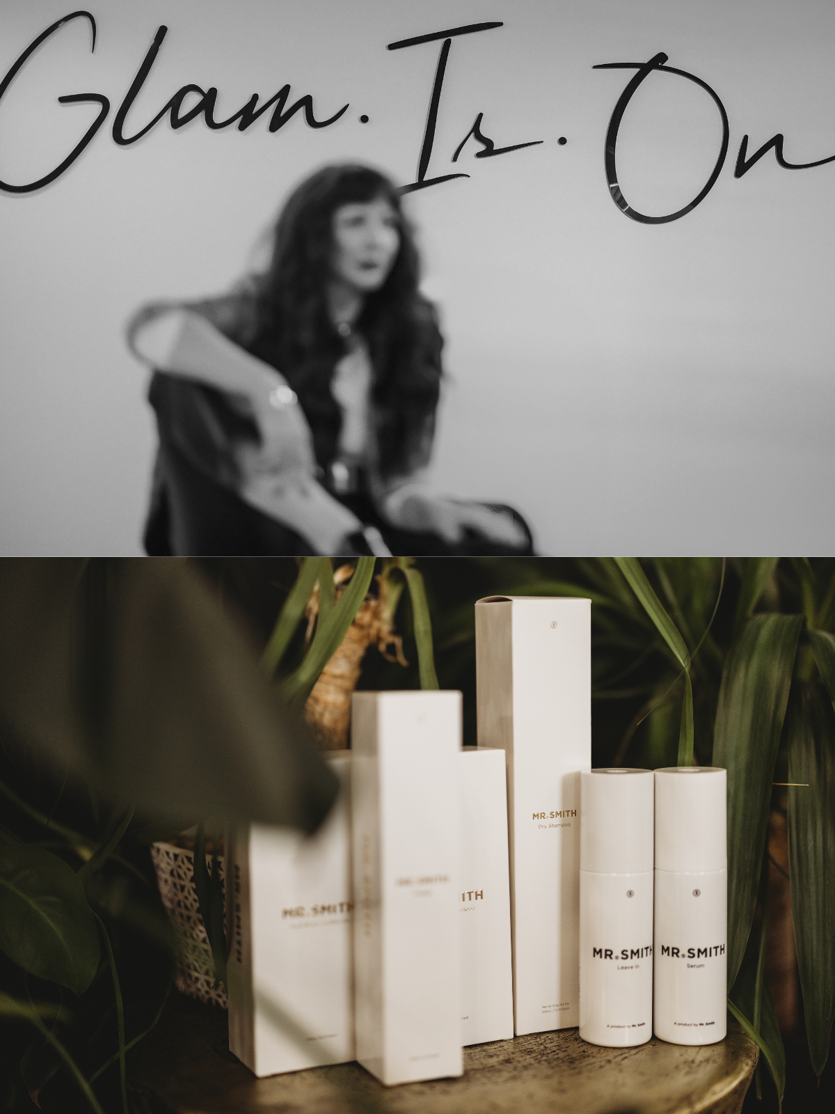 A woman sits in front of a sign that says glam is on