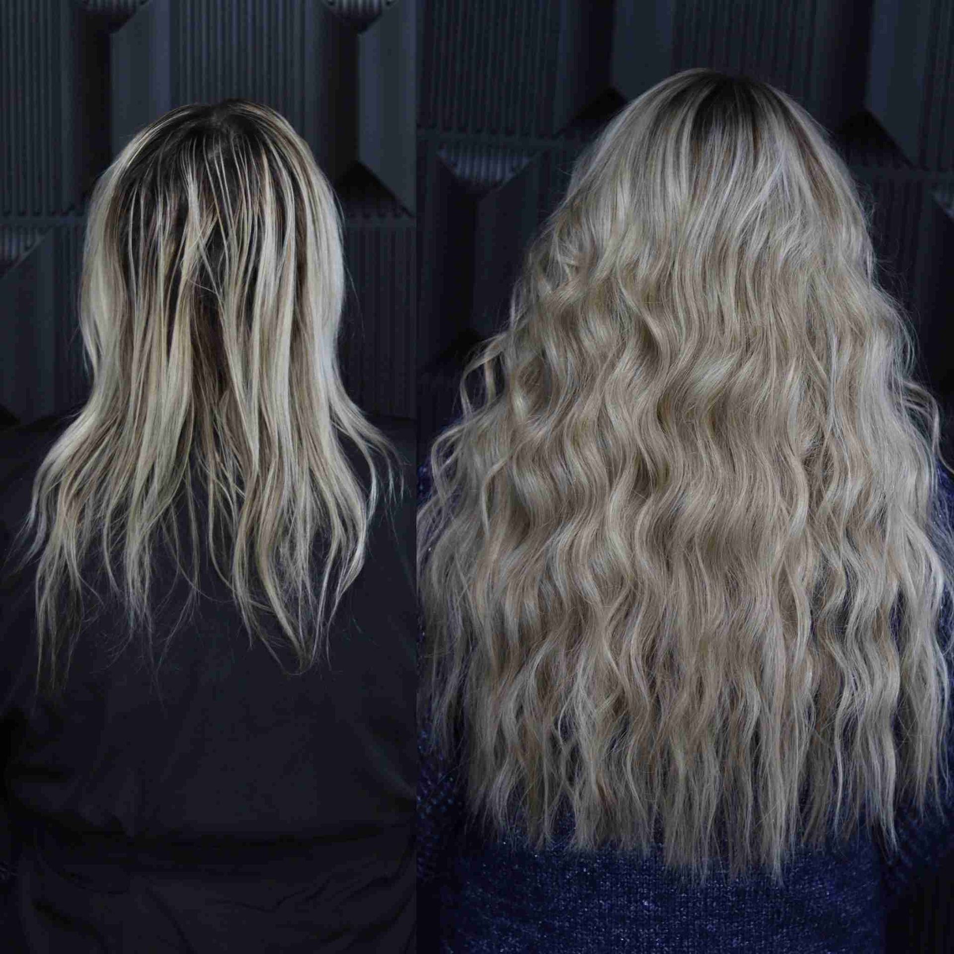 Two women with long blonde hair are standing next to each other.