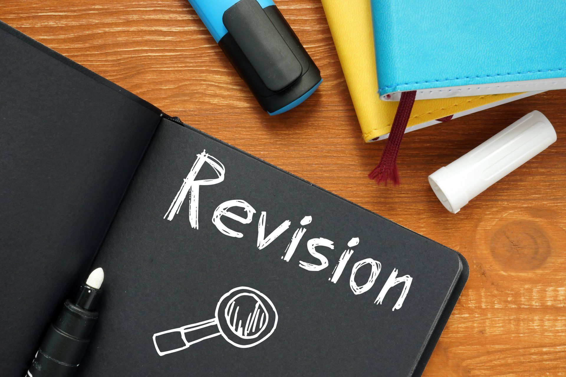 Revision Written On A Black Notebook — Media Blend — Orange County, CA