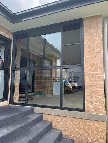 A Brick House with A Lot of Windows — Distinctive Glass & Aluminium in Port Kembla, NSW