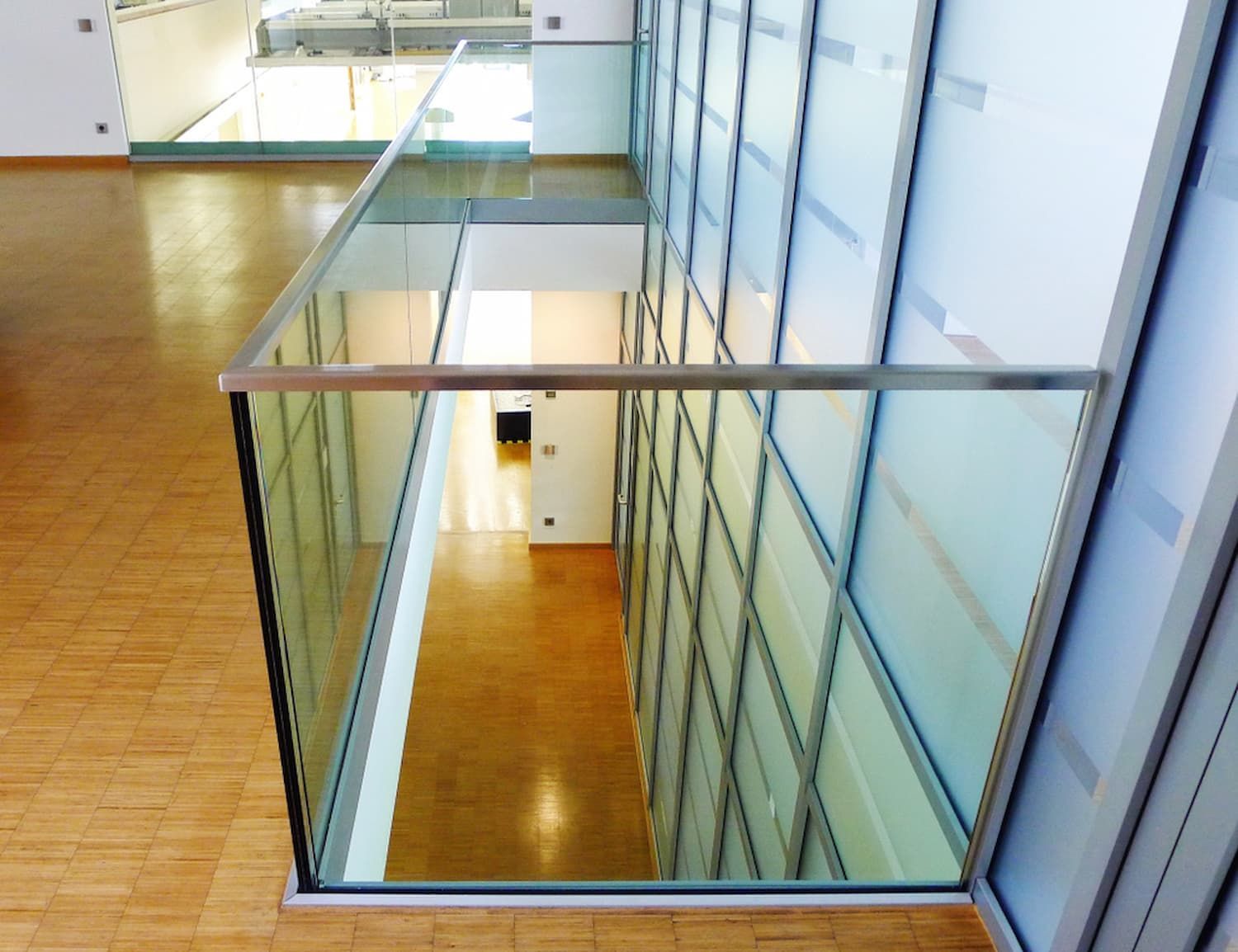 Looking Down a Staircase with A Glass Railing — Distinctive Glass & Aluminium in Dapto, NSW