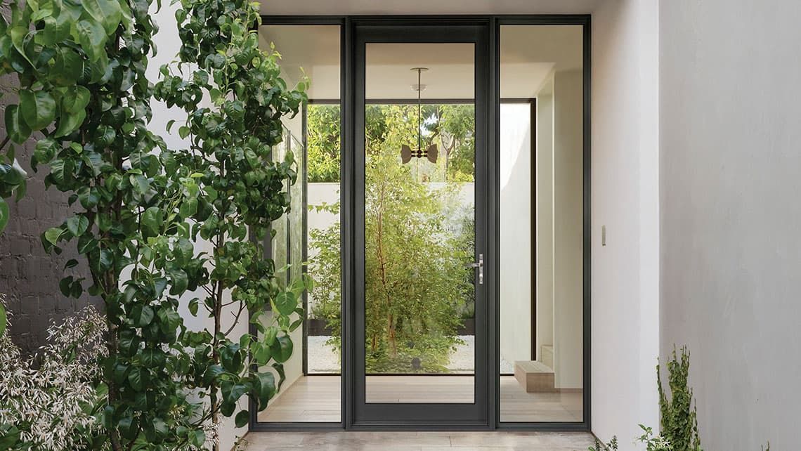 The Front Door of A House with A Lot of Windows — Distinctive Glass & Aluminium in Port Kembla, NSW