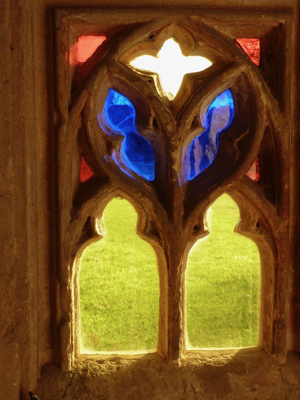 A stained glass window at Acton Court