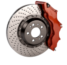 A close up of a brake disc with a red brake caliper on a white background. | Brakes For Less