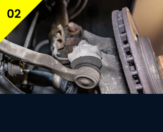 A close up of a brake rotor and a brake caliper on a car. | Wagamon Brothers