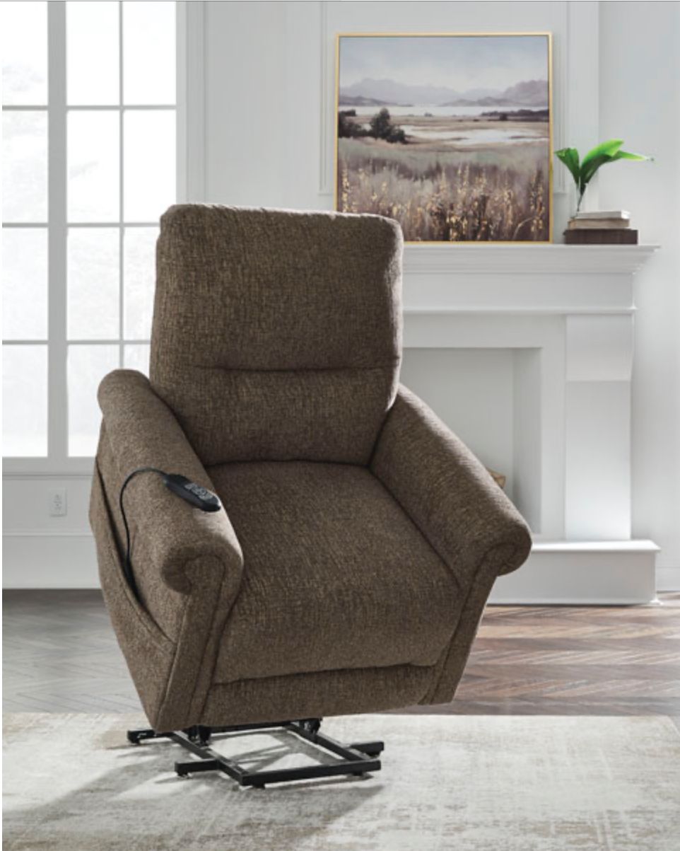 Brown upholstered lift recliner chair in a living room.