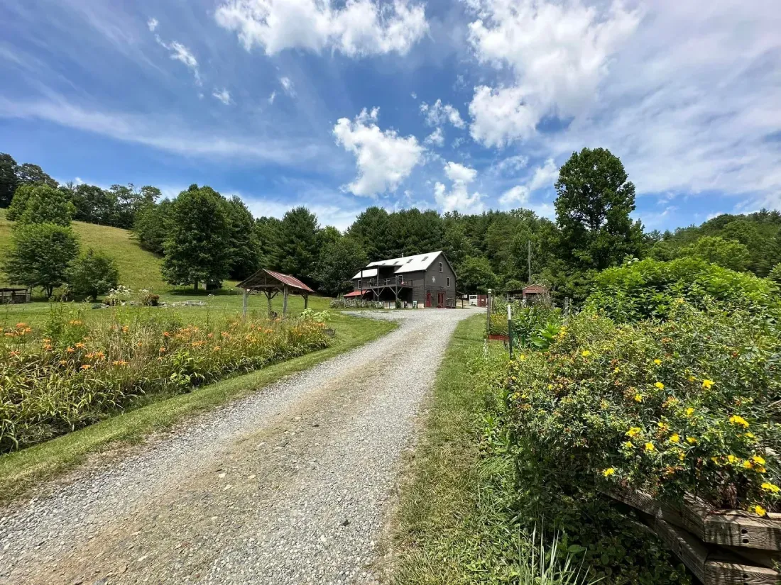 A gravel road leading to to Franny's Farmacy in Asheville, NC