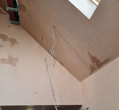 wall that has exposed wires