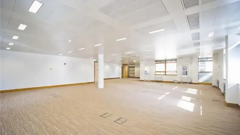 Interior view of an office space under construction and the text “ST JAMES COURT BRISTOL STAFF FACILITIES REFURBISHMENT WORKS”.