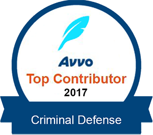 Avvo Top Contributor 2017 badge for Criminal Defense, featuring a blue feather, white background, and a blue ribbon.