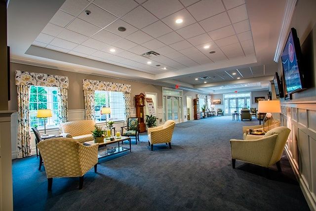 a living room filled with furniture and a television .