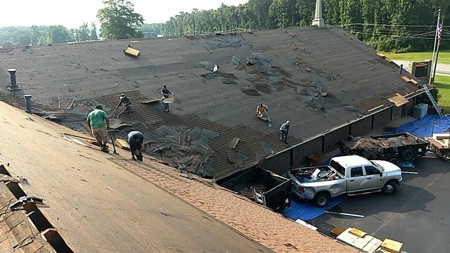 A truck is parked on the roof of a building