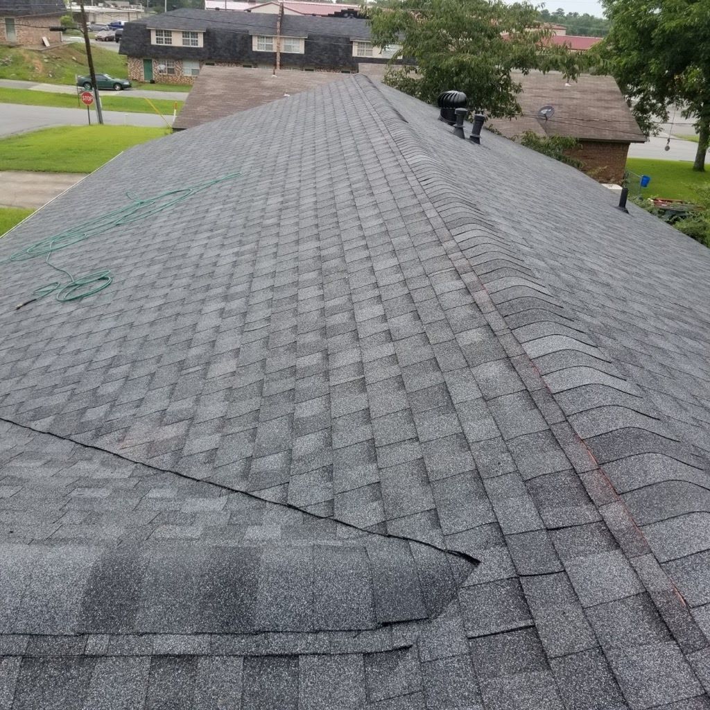 A close up of a roof with shingles on it.