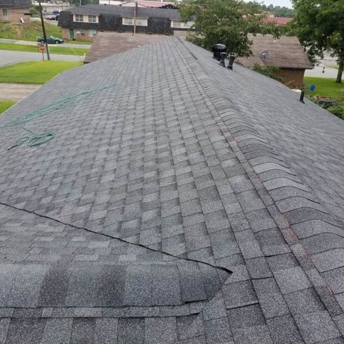 A close up of a roof with shingles on it.