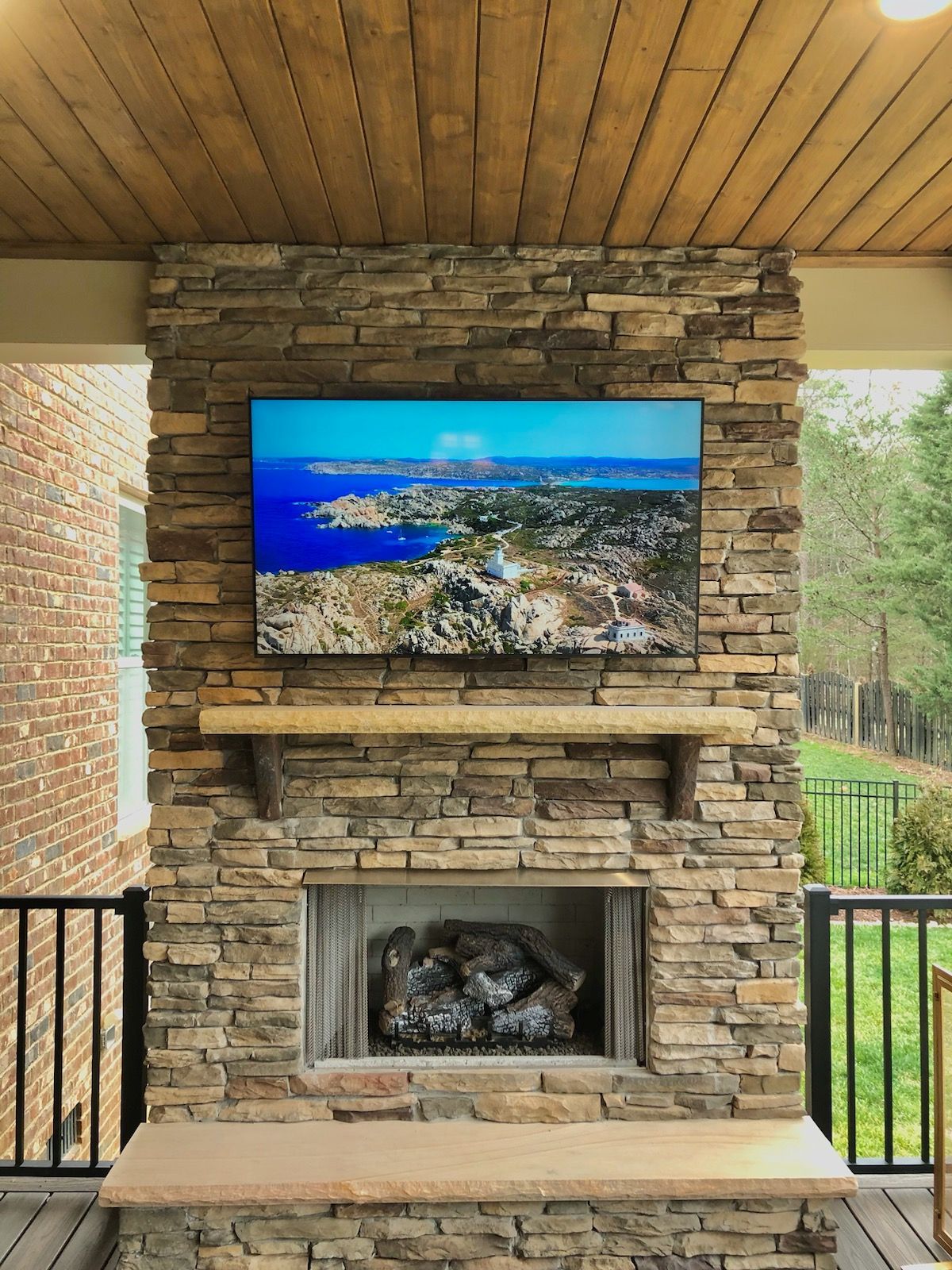 TV Mounting over fireplace mantel on wall