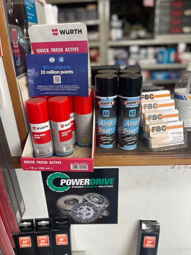 A Display Of Spray Bottles On A Shelf In A Store — Figtree Brake & Clutch Services in Figtree, NSW