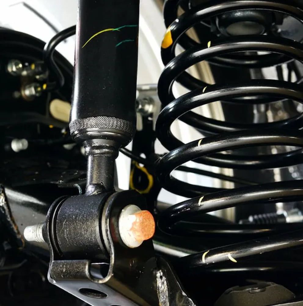 A Car Shock Absorber And Springs — Figtree Brake & Clutch Services in Figtree, NSW