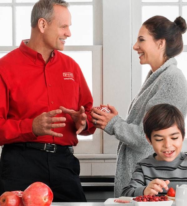 A man in a red shirt that says gprs on it