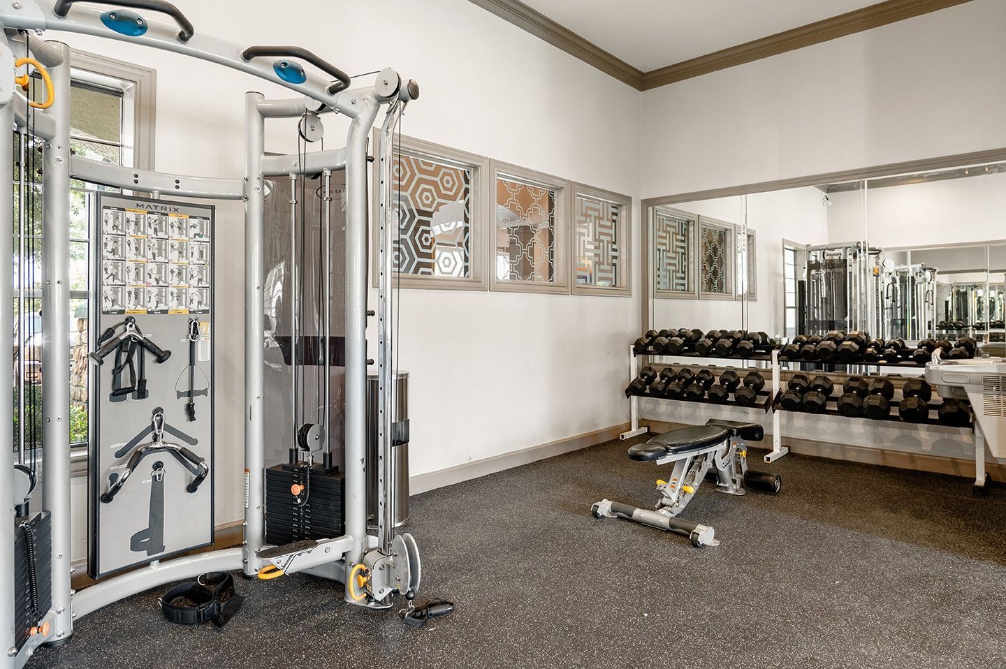 Interior view of a fitness center with gym equipment at Villas of Vista Ridge in Lewisville, TX.