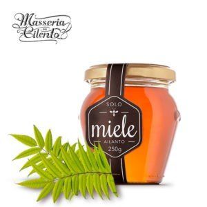 Un barattolo di miele con un'etichetta che dice miele