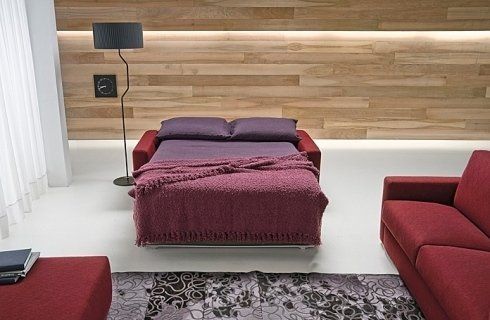 divano letto di colore viola