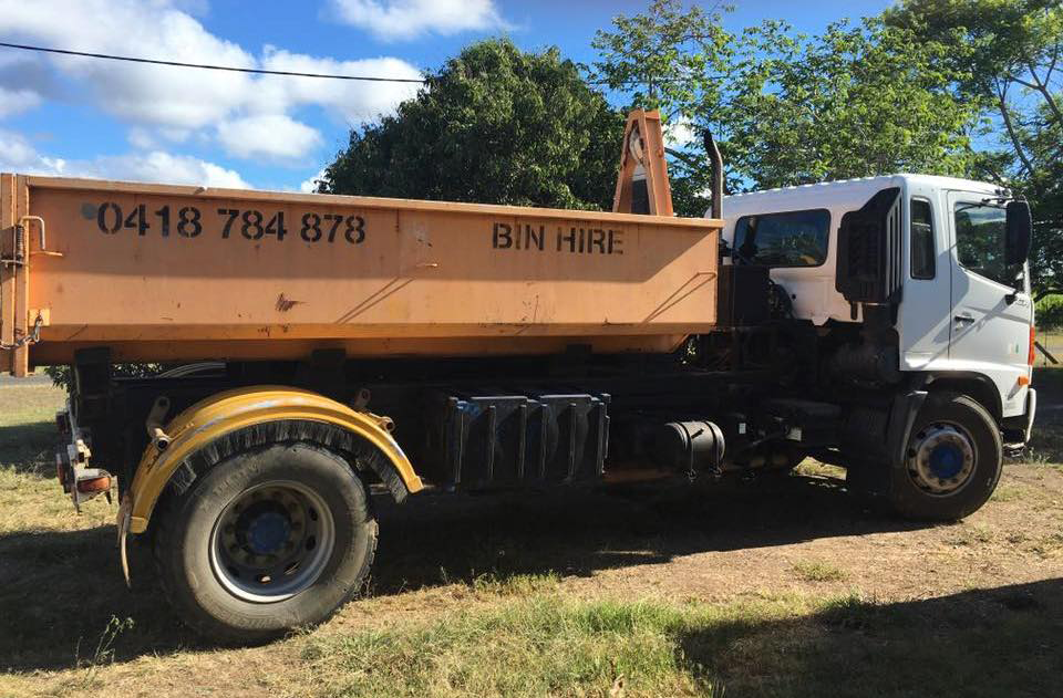 A Side View of A Skip Bin On A Truck — Bin Hire In Maryborough, QLD