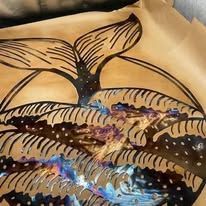 Whale tail design with waves, brown background. Blue, purple and yellow paints.