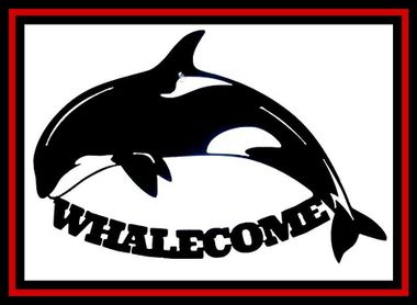 a picture of a killer whale with the words whalecome around it