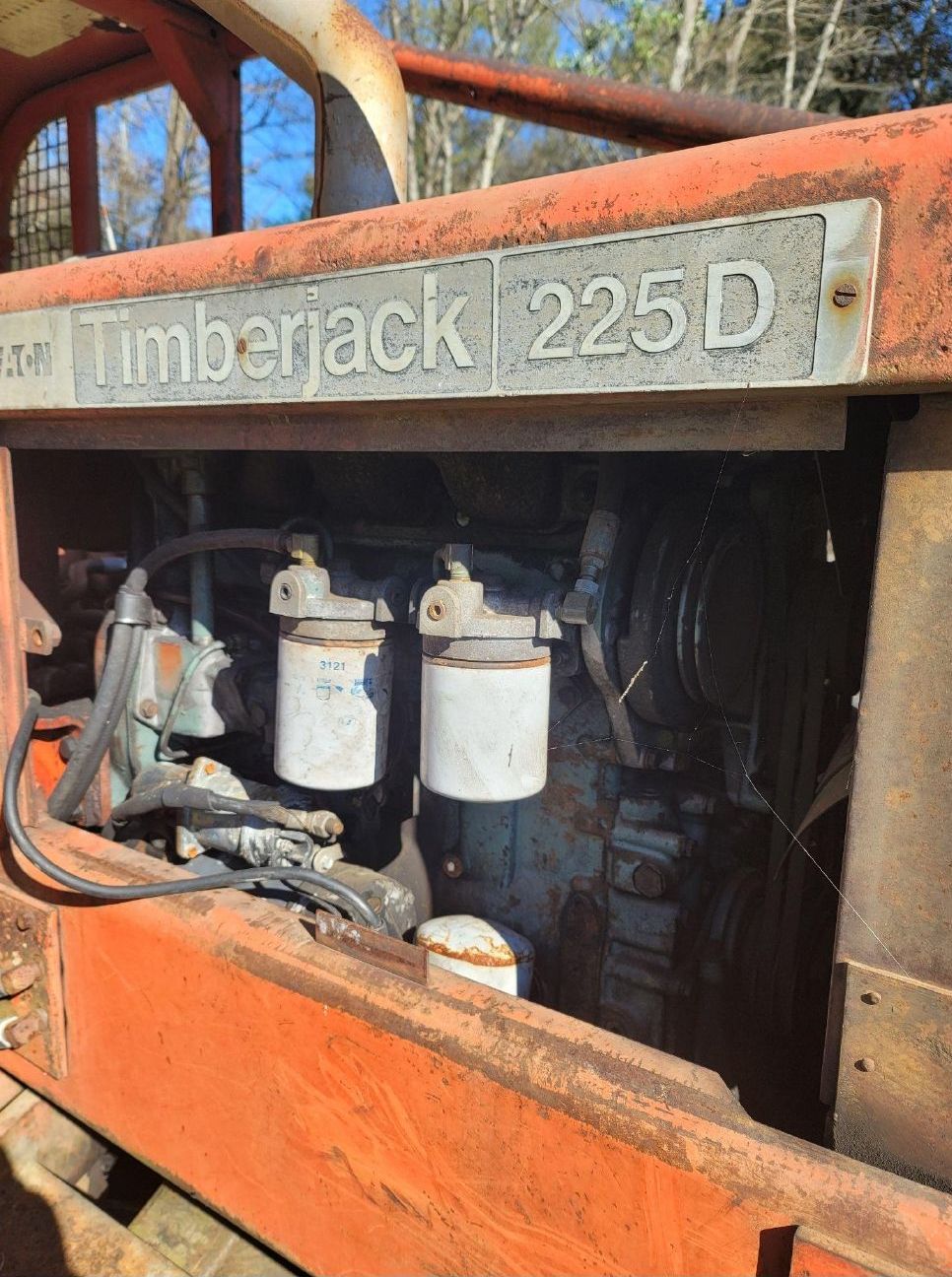 A close up of a timberjack 225d engine