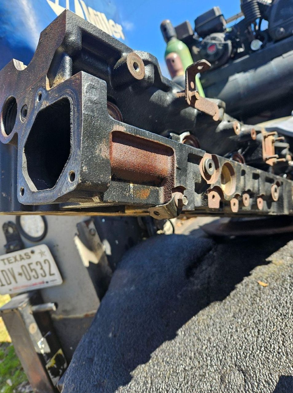 A texas license plate is on the back of a vehicle