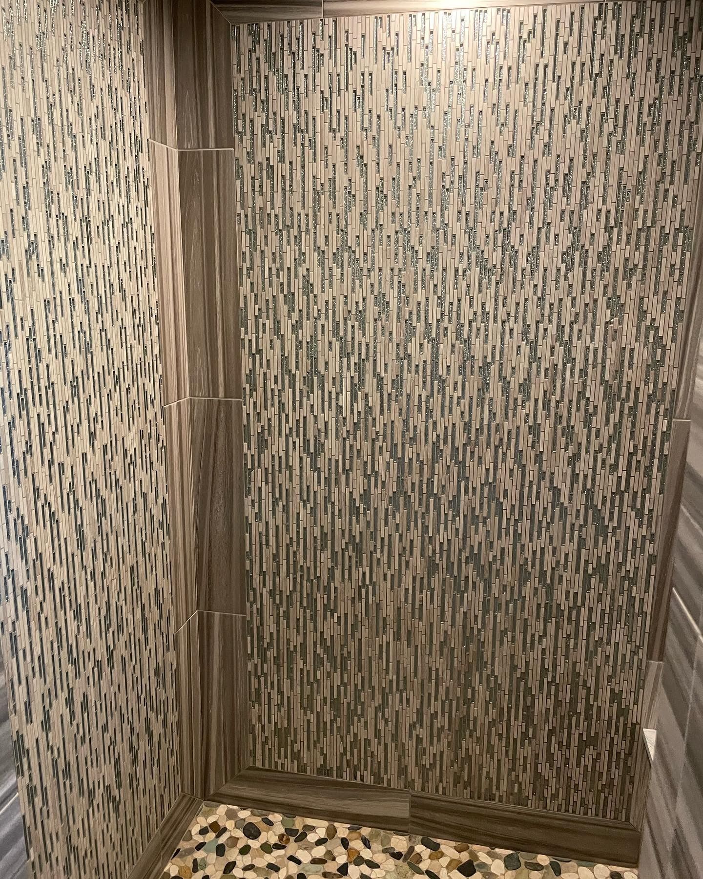 The inside of a moving truck filled with boxes and blankets.