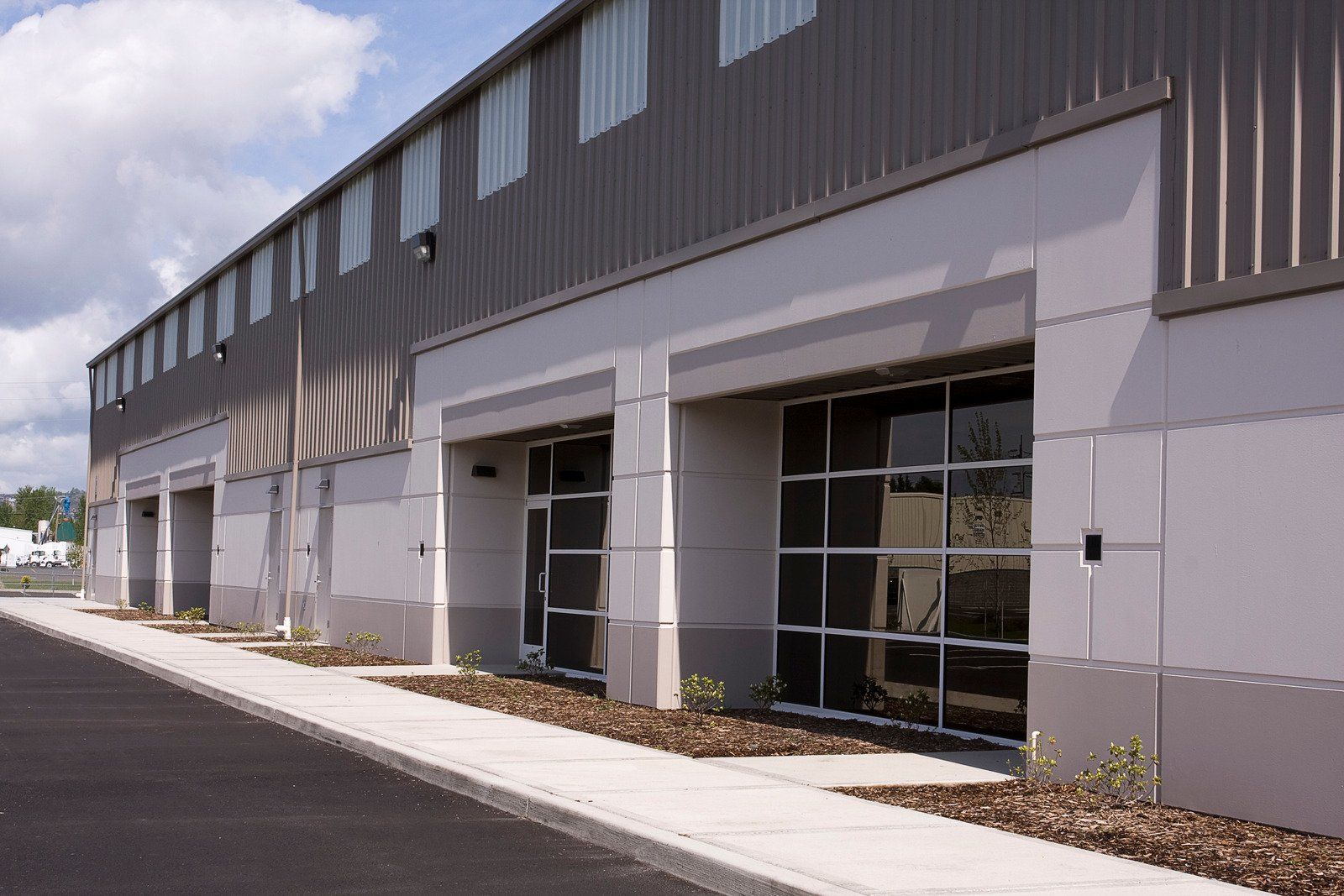 A large building with a lot of windows and doors