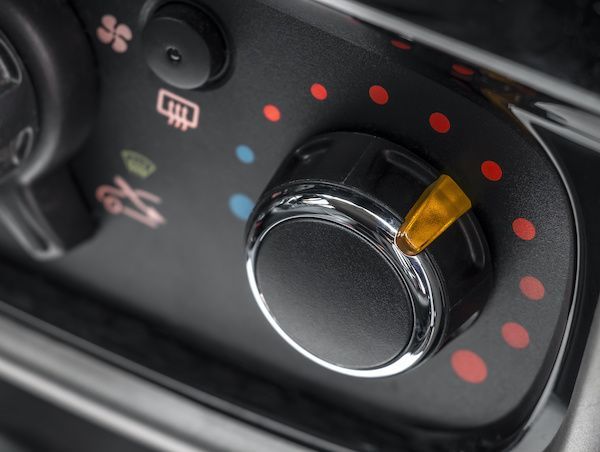 A close up of a car 's air conditioning control | Lex Brodies 