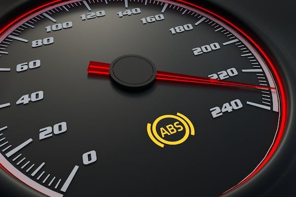 A close up of a speedometer that says abs on it | Lex Brodies