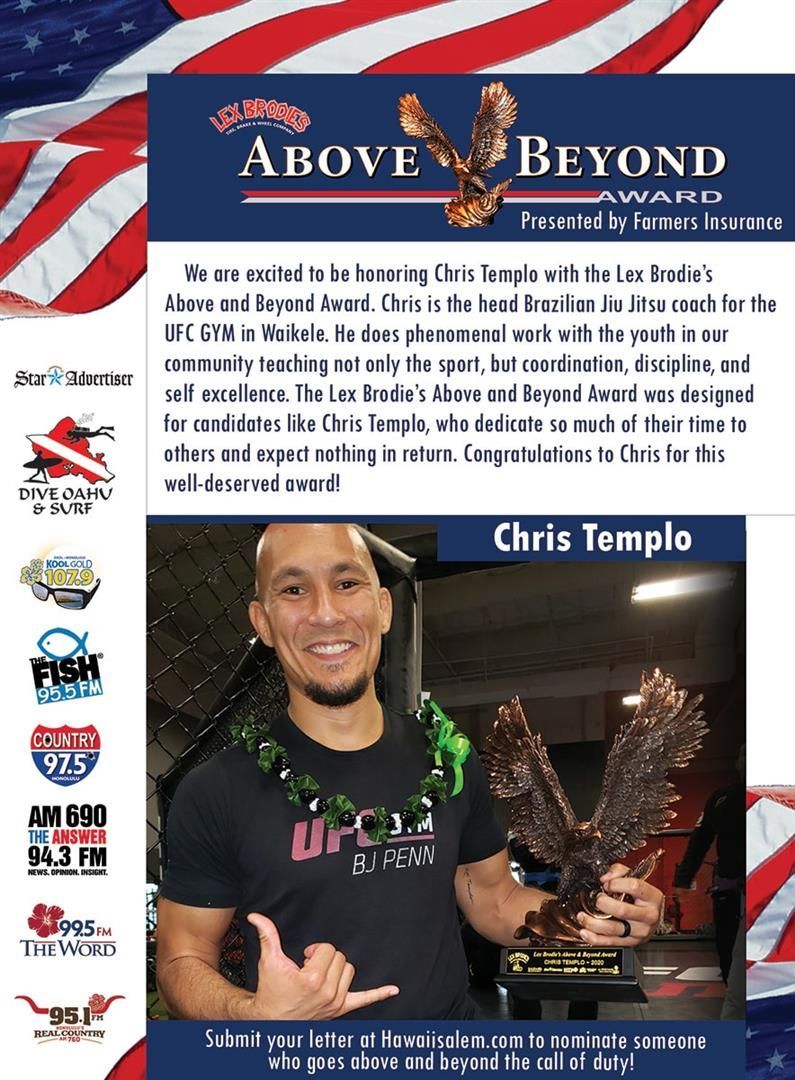 A man is holding a trophy in front of an american flag. | Lex Brodies