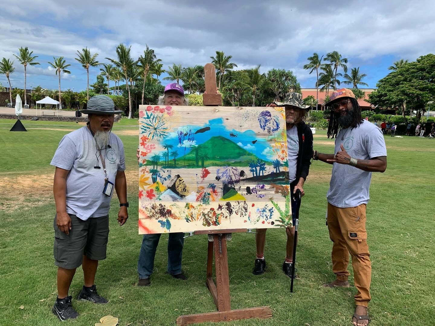 A person is holding a sign that says gratitude is
